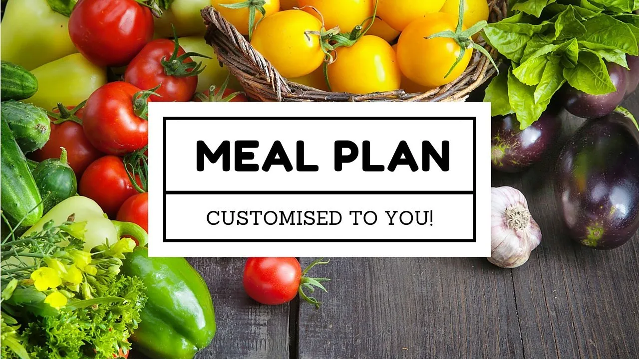 Layered meal planning cards on a desk